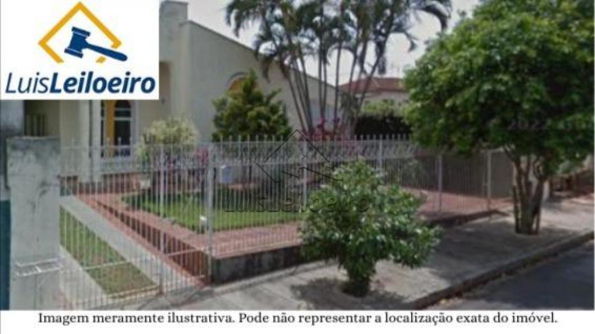 Casa Residencial construída sobre um terreno da Quadra 08, localizada na Rua Alan Kardec, n° 380, Barrio da Estação, Rancharia/SP. Área total de 450,00 m² e área construída 276,02 m².