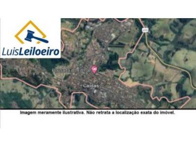 LOTE 0114 - 50% do Imóvel Uma Gleba de terras situada no lugar denominado FAZENDA SANTA TEREZA E LERANJEIRAS, no município de Caldas/MG. Com área remanescente de 53h.23a.00c e as benfeitorias de uma casa sede e quatro casas para colonos.